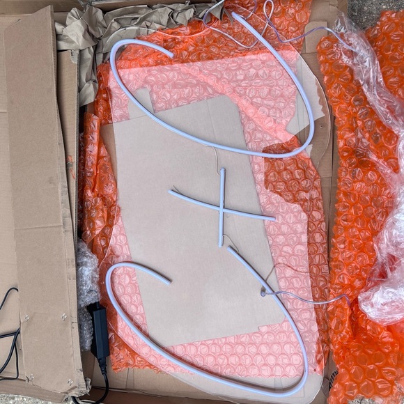 “C + C” neon sign